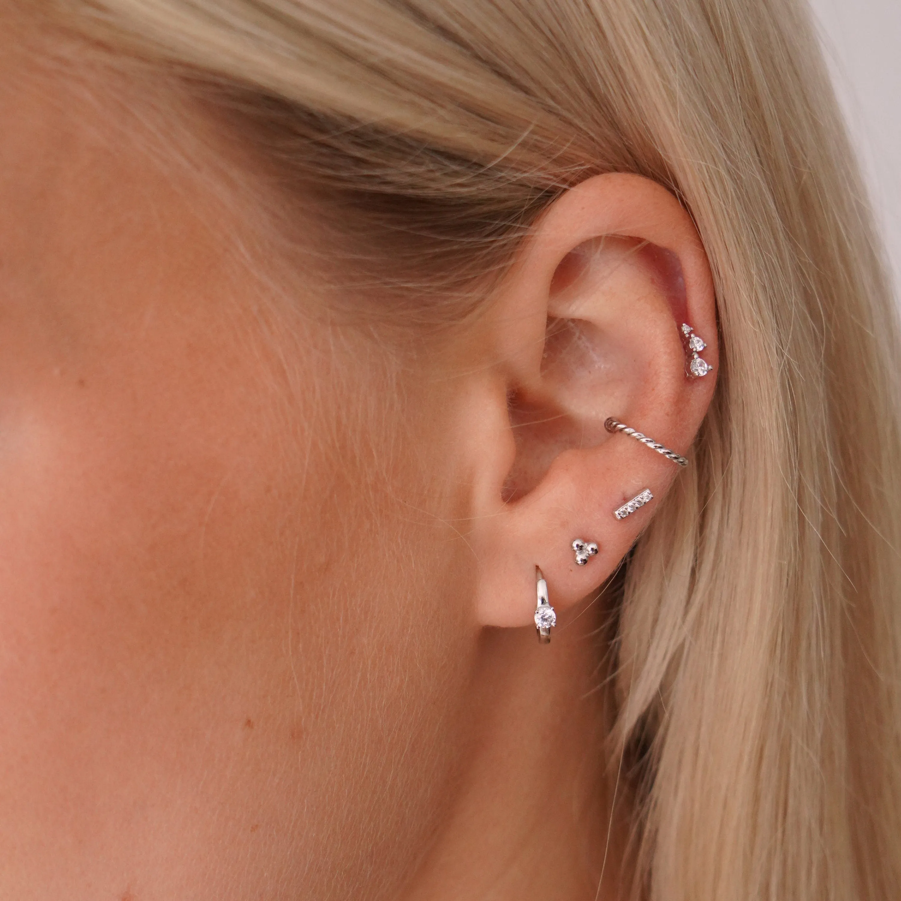Solitaire Crystal Huggie Hoops in Silver